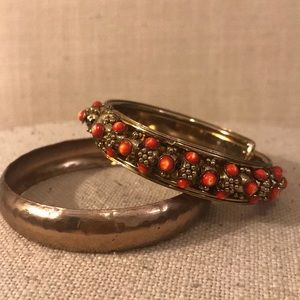 Brass bracelets with red coral inlay